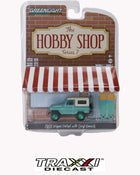 Chase GreenLight 1969 Nissan Patrol with Surfboards Green Machine Chase 97070C-48 Hobby Shop Series 7 1:64 diecast in factory packaging.