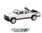 1991 Chevrolet S-10 Baja GreenLight 1:64 scale diecast side view in white with black lower trim and Baja graphics.