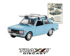 GreenLight 1:64 1970 Datsun 510 light blue two-door sedan with ski roof rack and vintage advertisement insert front three-quarter view