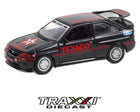 Side profile of Ford Escort RS Cosworth with large rear wing and Texaco graphics.