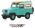 1969 Nissan Patrol with Surfboards Hobby Shop Series 7 GreenLight 1:64 front three-quarter view