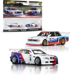 Hot Wheels Premium 2001 BMW M3 GTR 1:64 rear three-quarter view showing BMW Motorsport graphics and race wing.