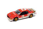 Johnny Lightning 1986 Ford Thunderbird Stock Car Swine No. 9 1:64 diecast in red, gold, and white race livery.