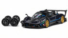 CM Model Pagani Zonda Revolucion metallic dark blue and carbon fiber 1:64 diecast with gold and black interchangeable wheel sets.