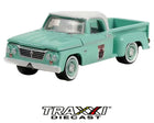 1965 Dodge D-100 Smokey Bear Series 1 pickup in mint green and white front three-quarter view