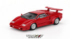 Mini GT Lamborghini Countach LP5000 QV red 1:64 diecast in front three-quarter view with silver wheels, side intakes and matching red rear wing.